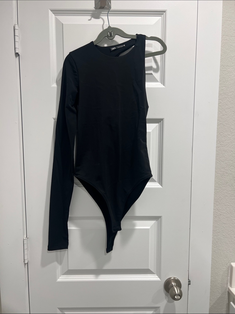 Zara Black Asymmetric Long-Sleeve One-Piece Bodysuit